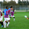 Football: Nine-man City beat UAL in scorching game